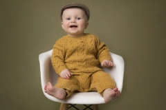 Cheeky-Sitter-Session-In-White-Chair-Flat-Cap-Clady