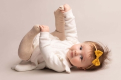 Baby Holding Feet with Hands