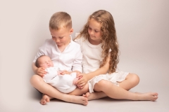 Siblings with new born baby